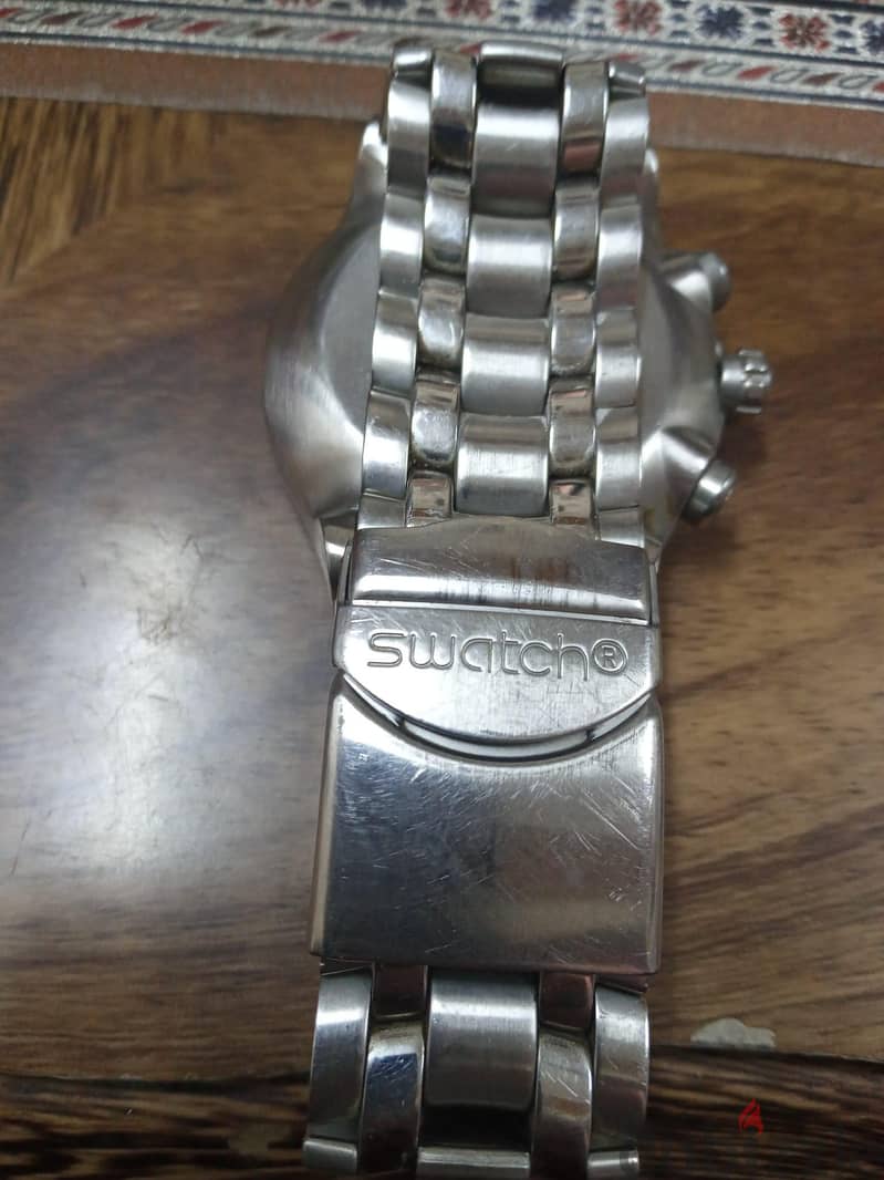 يوجد ساعة يد ماركة Swatch  واصليه ومديل قديمة سعر 120 دينار 1