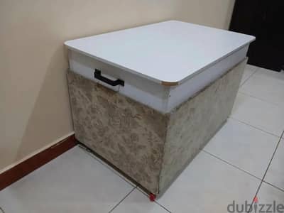 Coffee table with wheels and handles on side  Flat 1