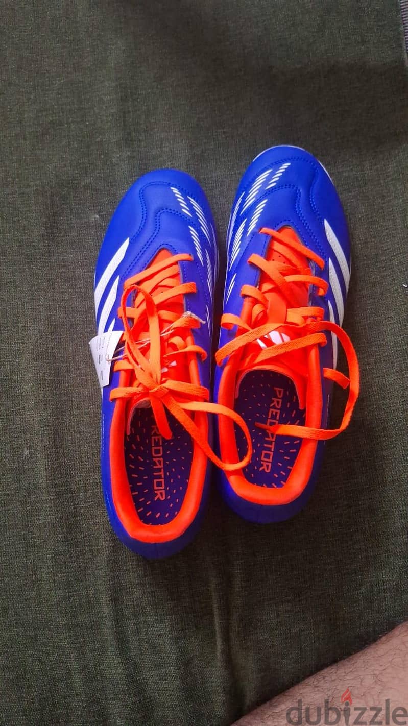 Adidas football shoes and it new only . . . . . 1