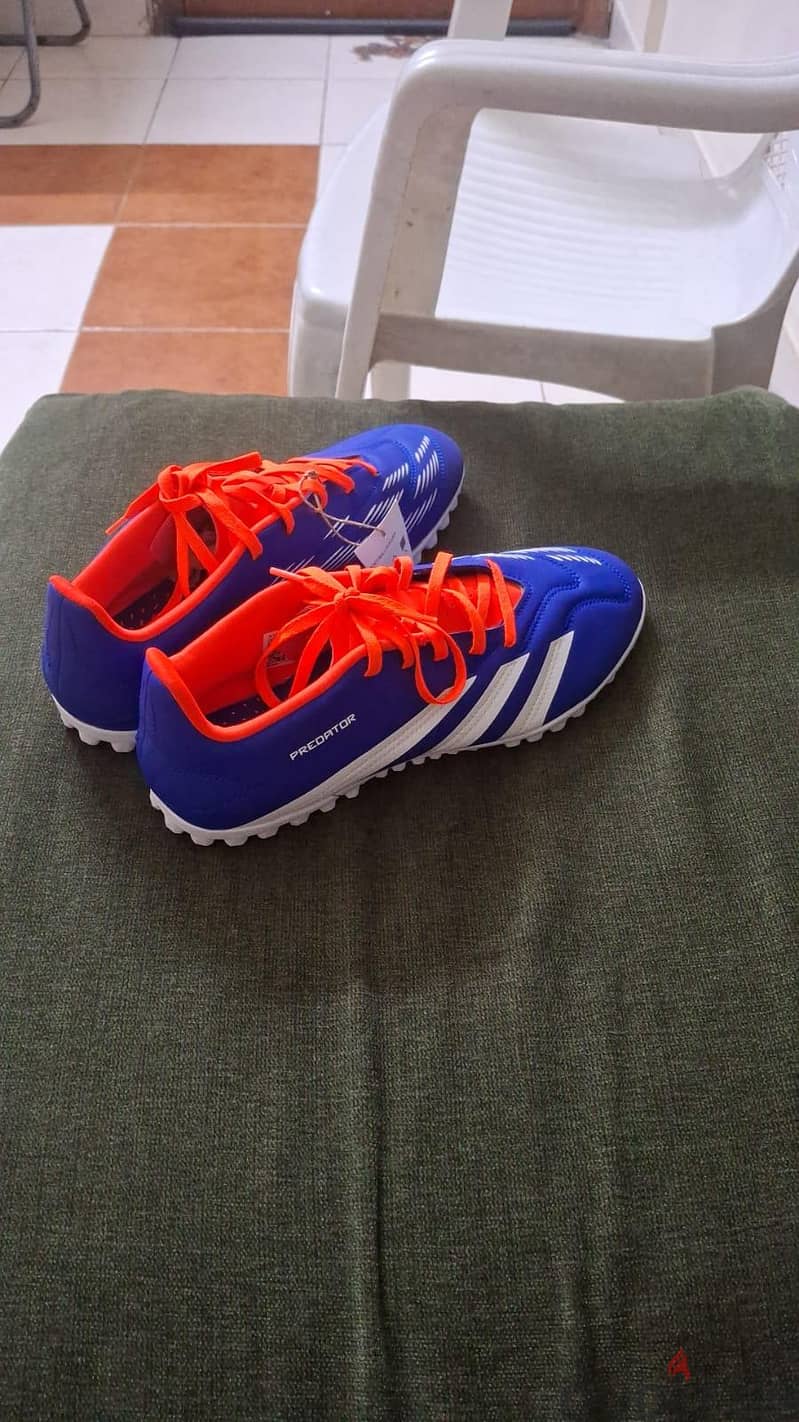 Adidas football shoes and it new only . . . . . 3