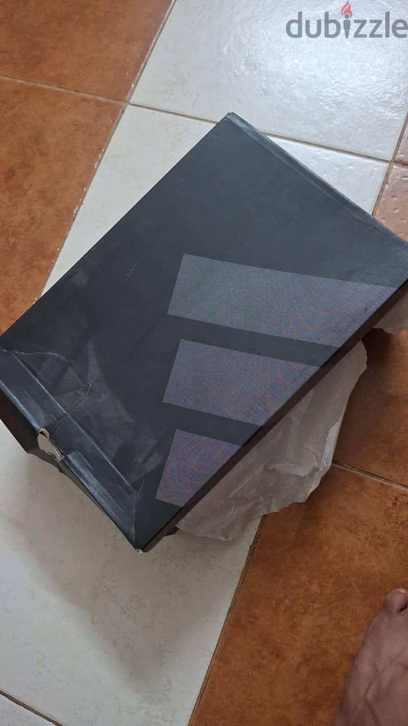 Adidas football shoes and it new only . . . . . 4