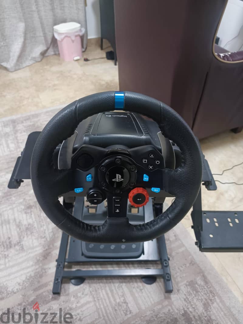 Logitech G29 steering wheel and stand. 1