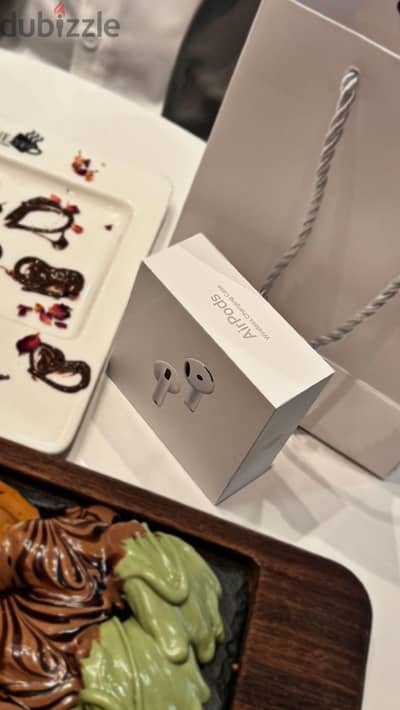Apple AirPods 5 with Wireless Charging Case Like New