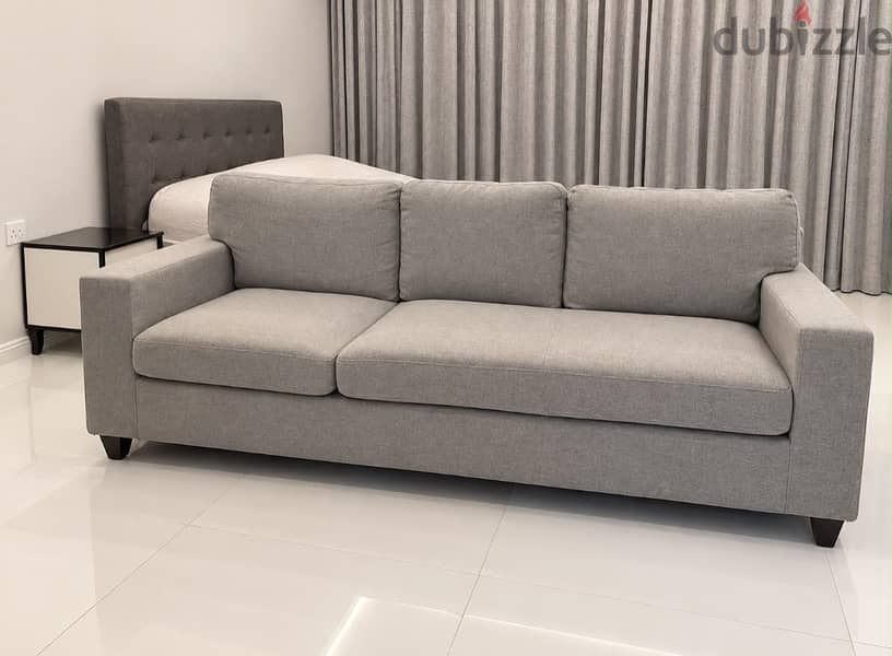 Very clean grey sofa 1