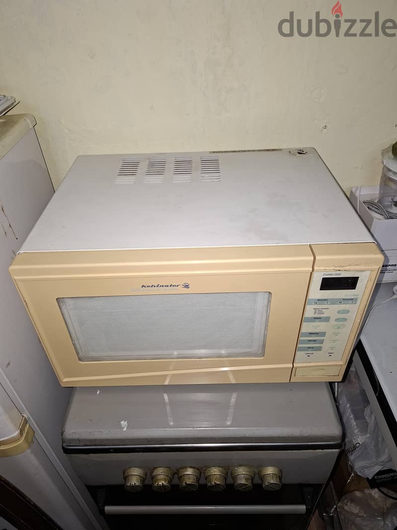microwave oven in working 9bd 35litre 1