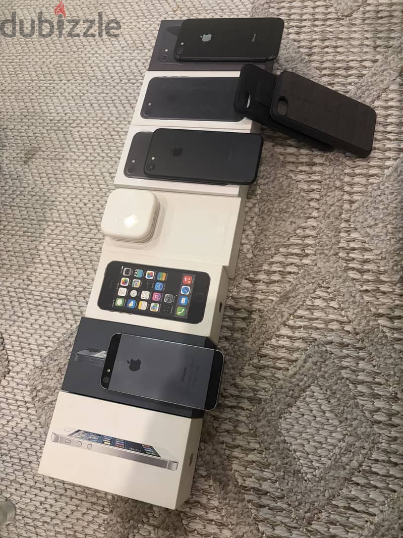 For sale: 3 iphones with box and 4 empty boxes. 1