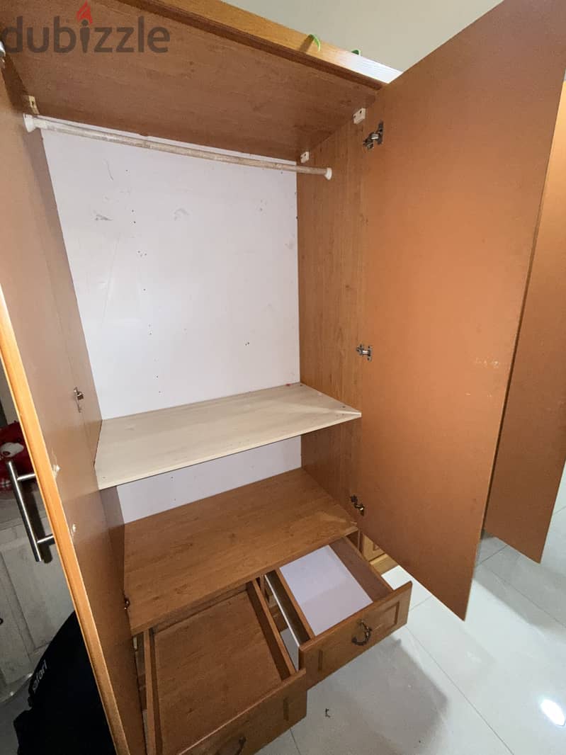Cooking range, wardrobe, dining table for sale 4