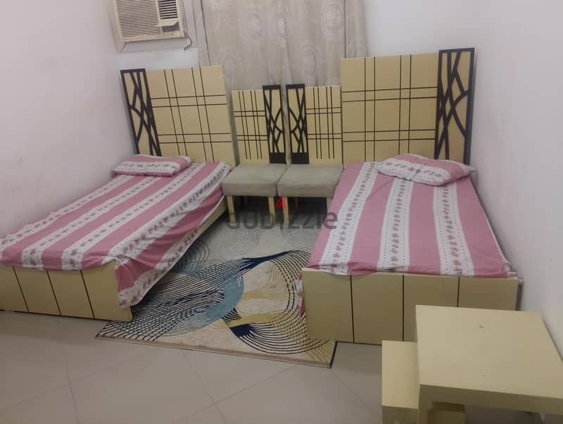 Two beds and two chairs 1