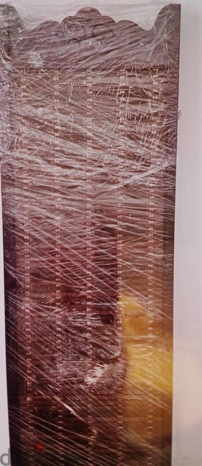 Wooden Partition, Painting and Mirror and cupboard