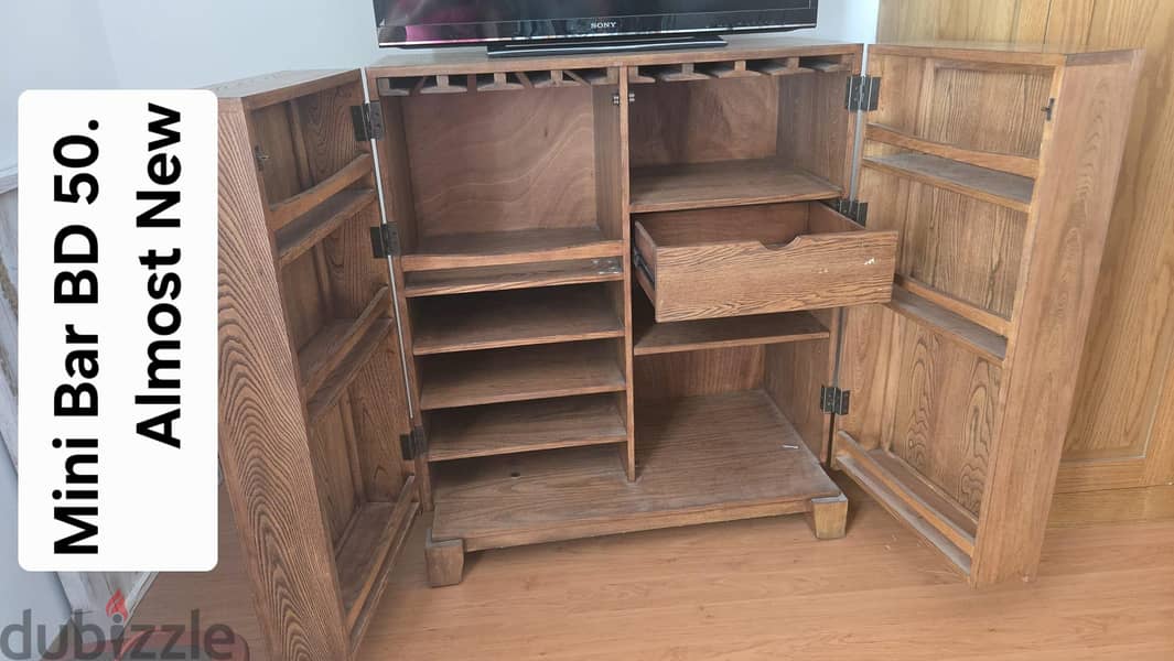 Wooden Partition, Painting and Mirror and cupboard 5
