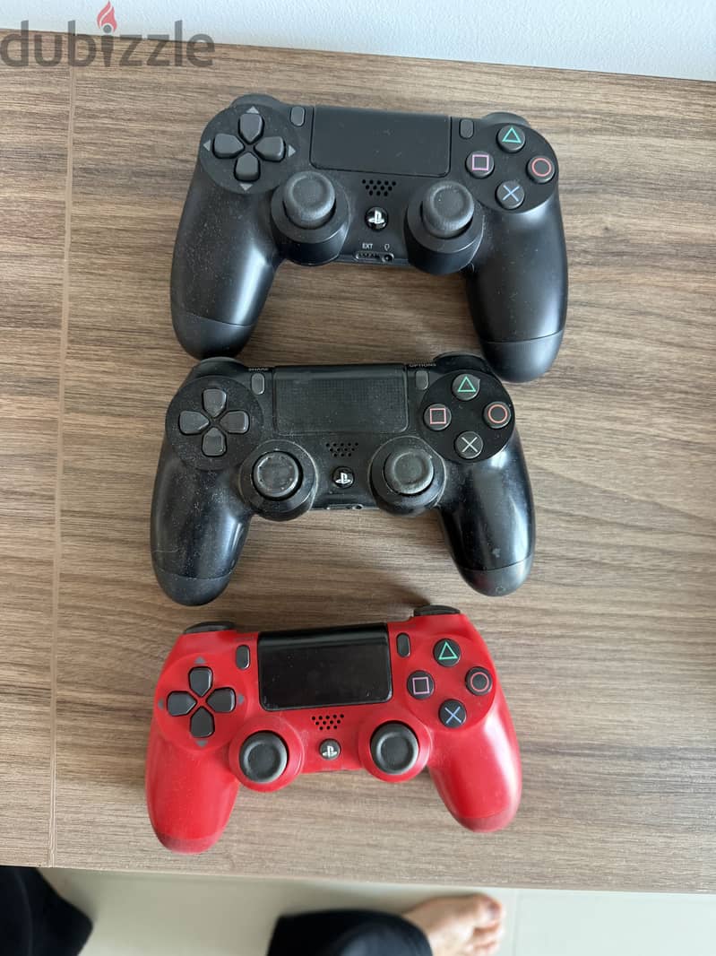 Sony Playstation 4 Pro + 3 Controllers + 5 PS4 games Bundle 1