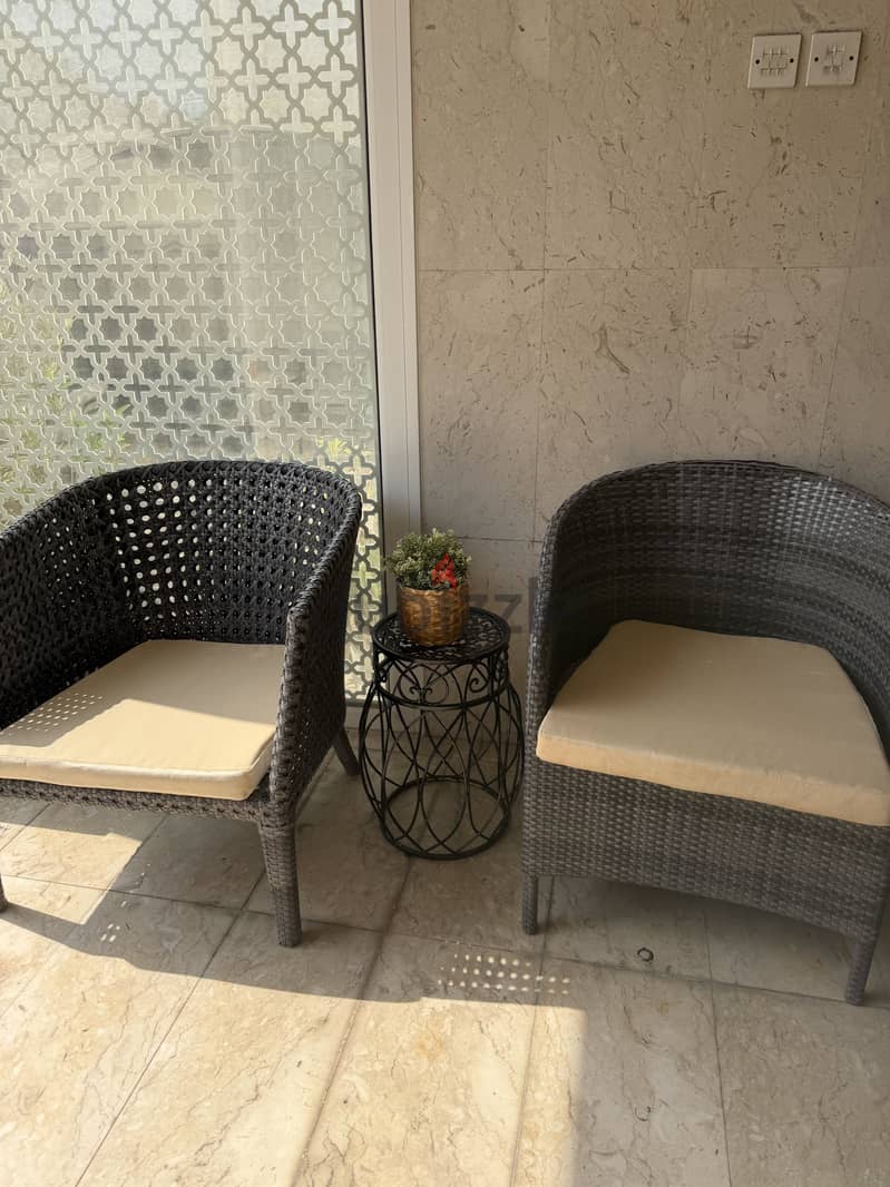 Two chairs with table 45 BHD 1