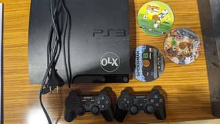 PlayStation 3 with two controllers and few games 0