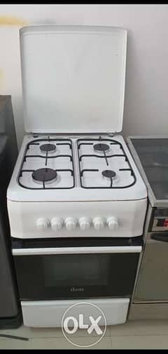 4 burners cooking range good condition delivery available 0